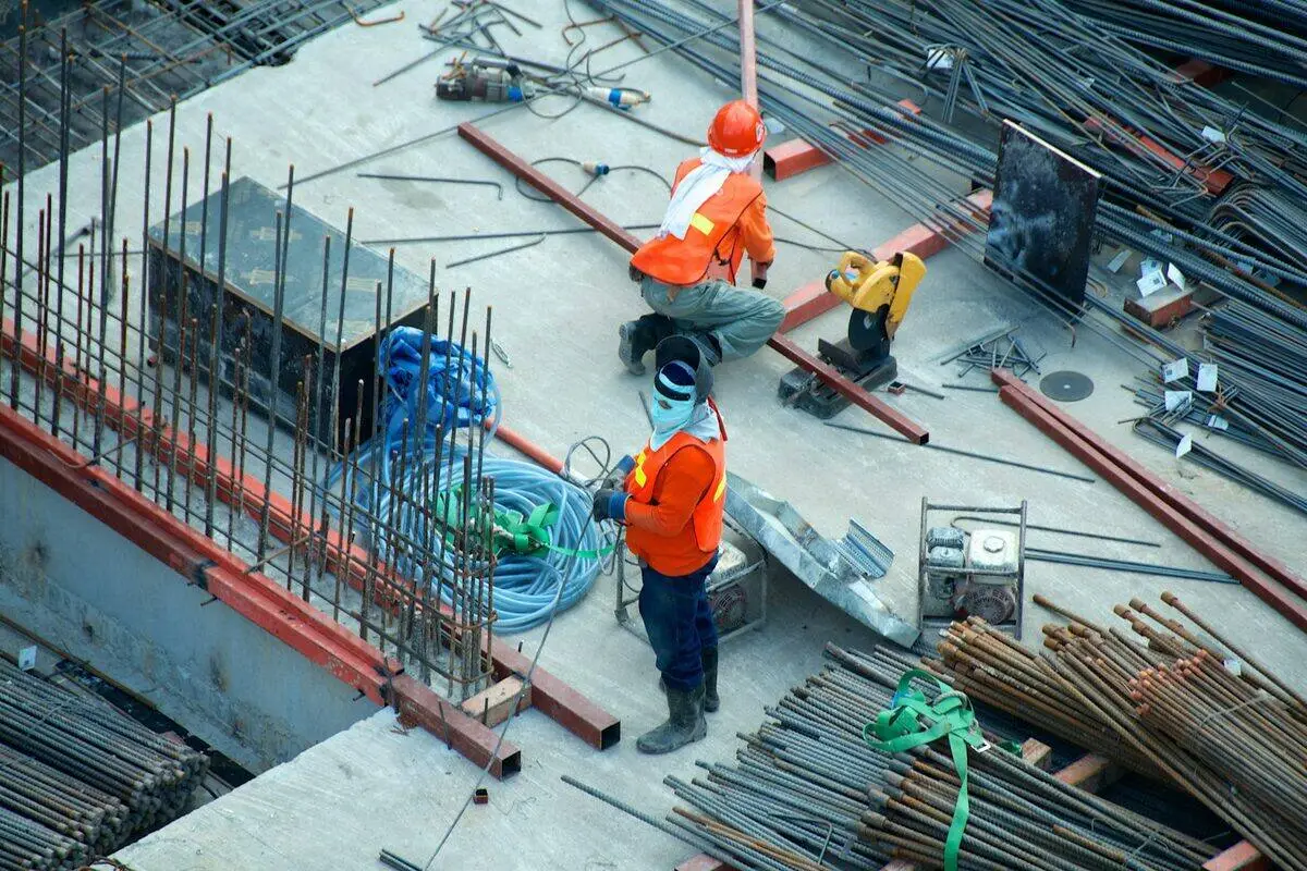 Live-monitored security cameras on a construction site at night